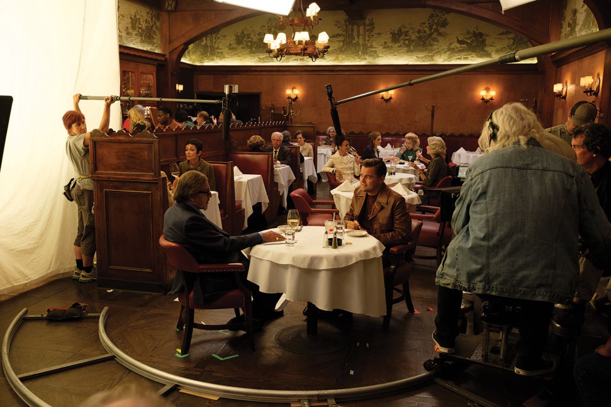 DiCaprio sits across from Al Pacino (playing Marvin Schwarzs) in Hollywood’s Musso & Frank Grill. “All lighting fixtures were rewired, repaired or replaced to be able to accept larger-wattage bulbs that we dimmed to photographically pleasing levels and color,” Kincaid explains. “A Maxi-Brute bounce provided the key light, and two 2-by-8 LiteGear [LED units] were dimmed up to increase backlight or lessened to reduce fill as the camera tracked.”