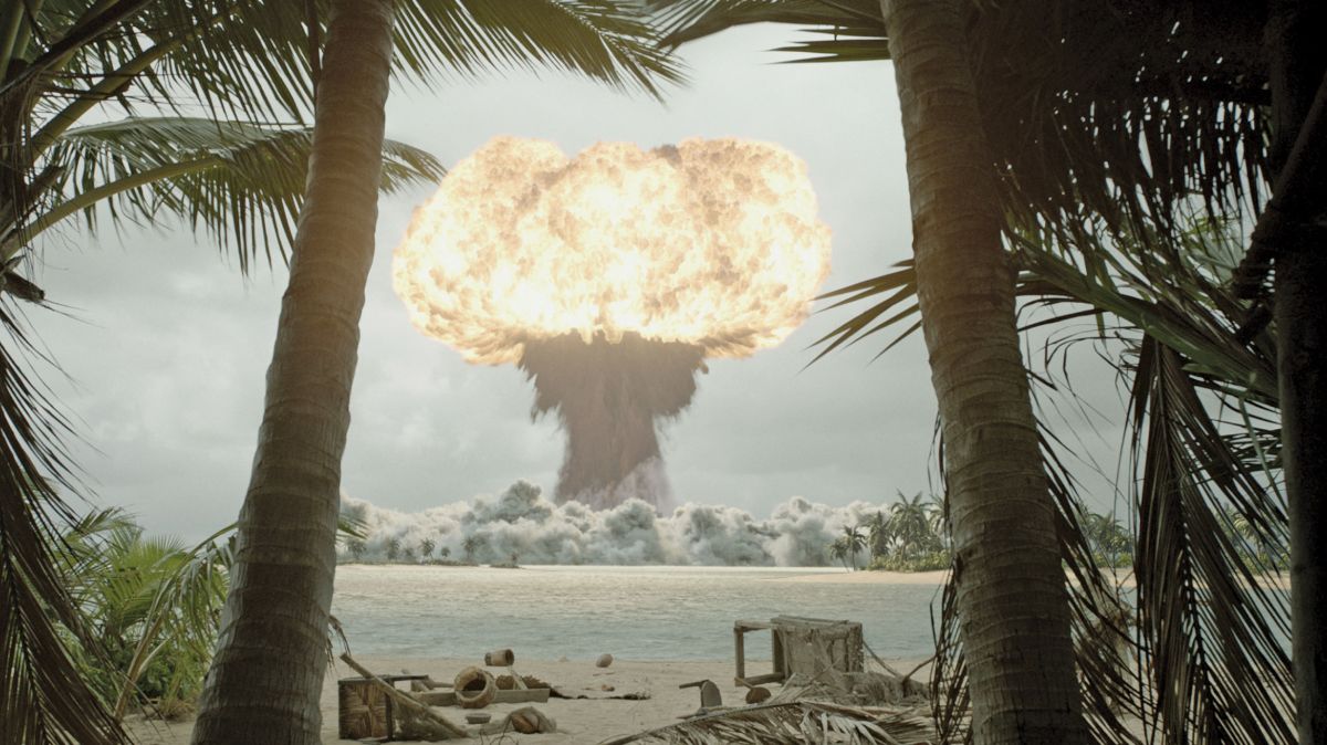 In the movie's plot, the 1950s atomic blast on Bikini Atoll was no mere test, but the U.S. military's fruitless attempt to kill dangerous creatures. Compositions such as these, constructed in-depth with recognizable elements in the foreground, help establish the film's epic scale.