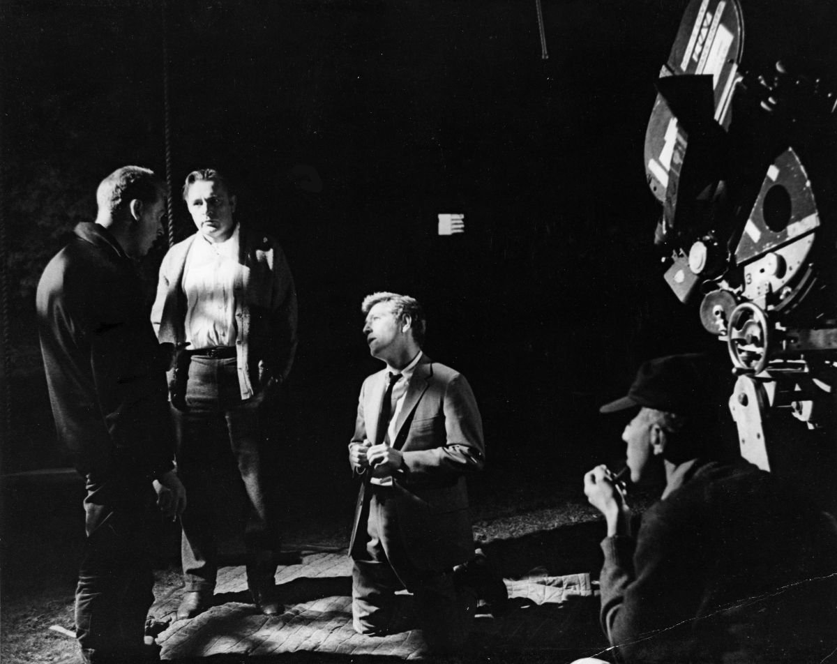 Nichols gives instructions to Richard Burton and George Segal prior to the shooting of night location sequence during extensive filming on the campus of Smith College in Northampton, Mass.