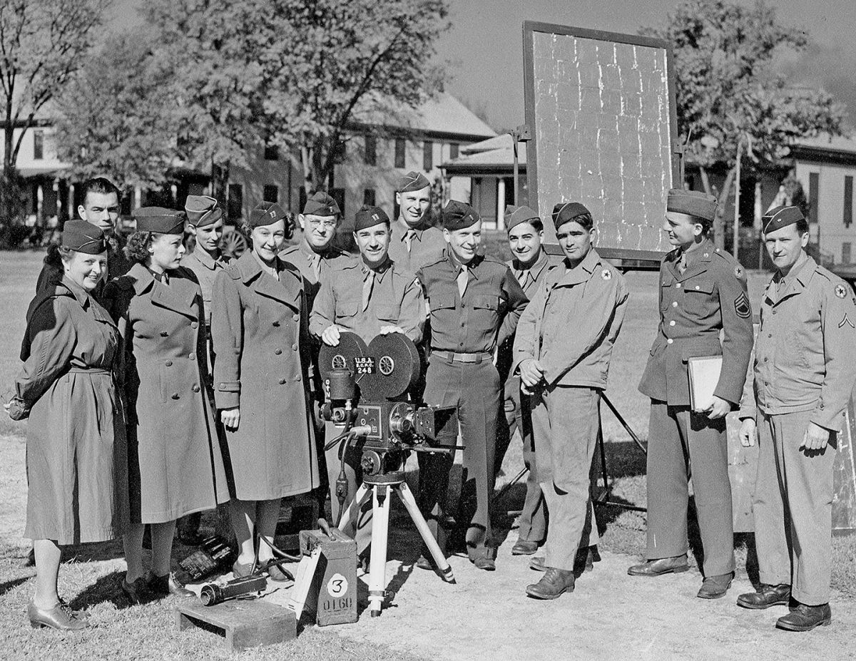 At center is Leo Tover, ASC at Ft. Oglethorpe with members of his photographic unit, including future ASC member Gerald Hirschfeld (fourth from right, in back).